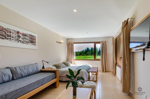 Posezení v ubytování Villa Huapi