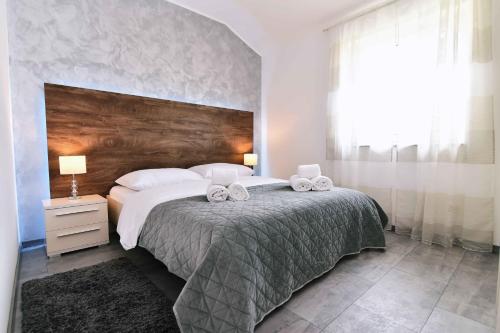 Voodi või voodid majutusasutuse Luxury Apartment Maria Solare toas