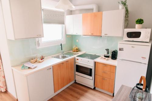 Η κουζίνα ή μικρή κουζίνα στο Joy Spot