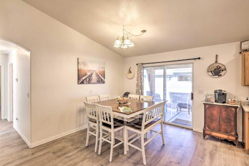 a dining room with a table and chairs at Kid-Friendly Kingman Home Near Parks and Dining in Kingman