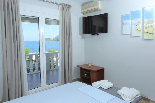 Ένα ή περισσότερα κρεβάτια σε δωμάτιο στο Chrispy Apartments