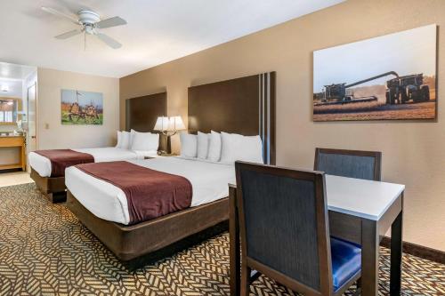 Ένα ή περισσότερα κρεβάτια σε δωμάτιο στο Best Western Orchard Inn