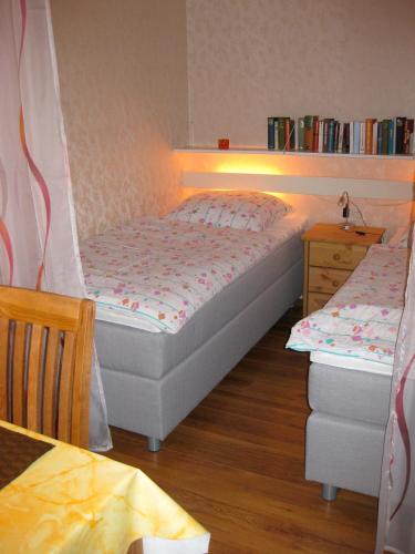 מיטה או מיטות בחדר ב-Haus Nautic 4-3-6