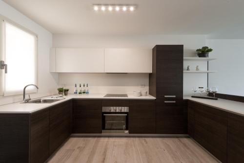 Kuchyň nebo kuchyňský kout v ubytování Filario Hotel & Residences