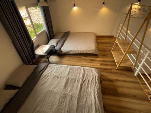 Dốc Garden Homestay Đà Lạtにあるベッド