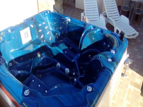 a blue bath tub sitting on top of a table at Apartments Vala in Vinišće
