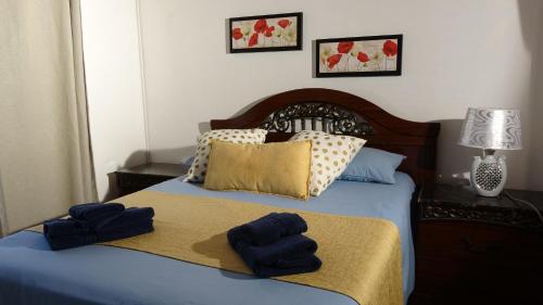 Кровать или кровати в номере Elilia's Haven