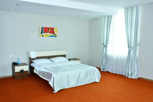 Кровать или кровати в номере Sumgait Olimpik SportComplex
