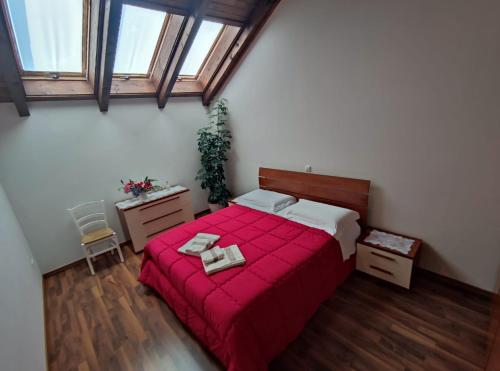 Postel nebo postele na pokoji v ubytování Apartments Vila Bovec