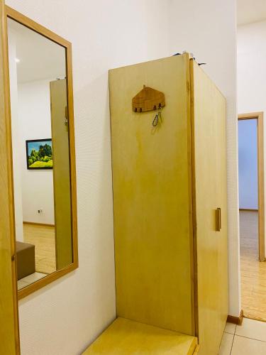 a door in a room with a mirror at Gobi-Girl in Ulaanbaatar