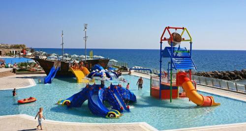 a water park with a bunch of slides and rides at Petra Mare in Ierápetra