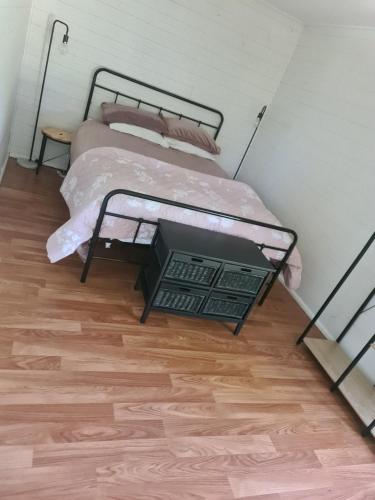 Ένα ή περισσότερα κρεβάτια σε δωμάτιο στο Kooloora Cottage