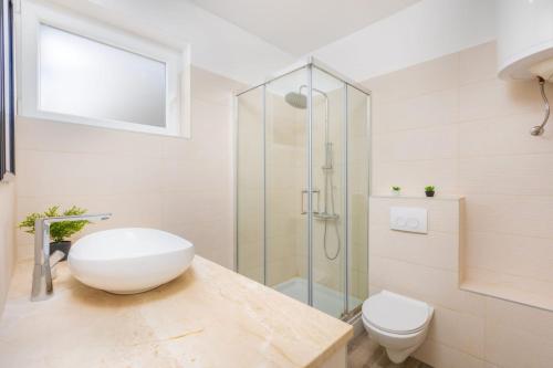 Kúpeľňa v ubytovaní Apartman Dokić 3