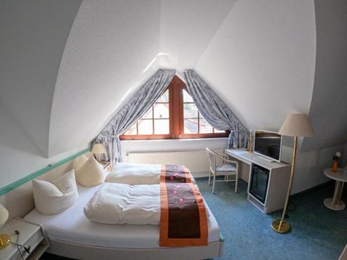 Postel nebo postele na pokoji v ubytování Hotel Diana