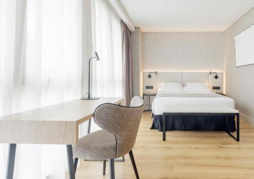Postel nebo postele na pokoji v ubytování Hotel Ilunion San Sebastián