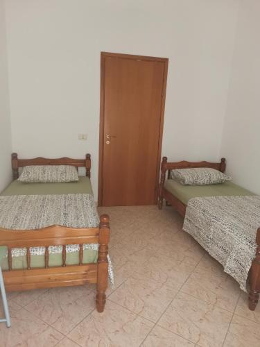 Llit o llits en una habitació de Home