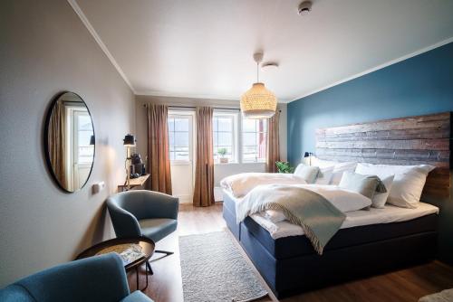 Kama o mga kama sa kuwarto sa Hustadvika Havhotell - by Classic Norway Hotels