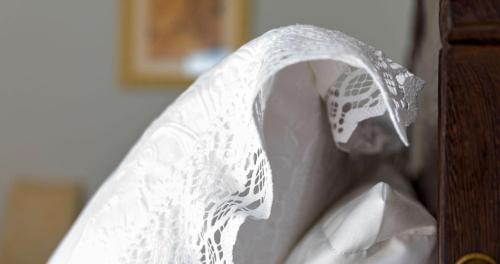 a white veil is taped to a wall at Villa da Praia in Sintra
