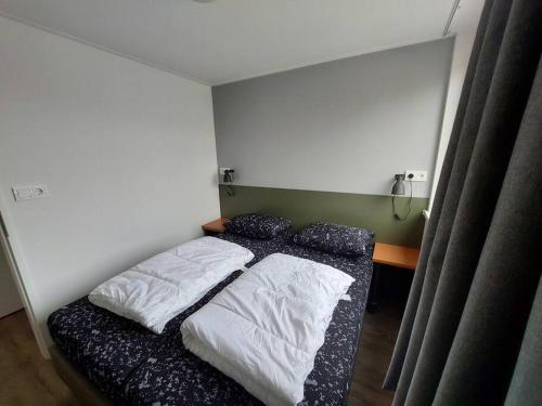 Ένα ή περισσότερα κρεβάτια σε δωμάτιο στο Zuidstraat 105,2