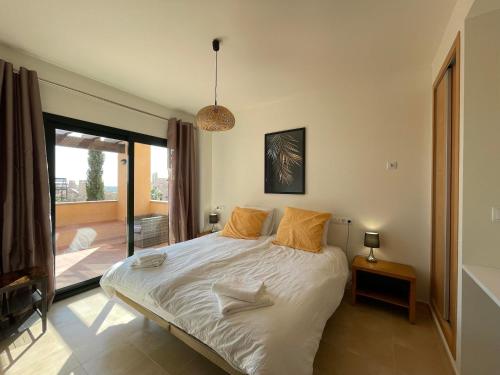 Ένα ή περισσότερα κρεβάτια σε δωμάτιο στο Casadeluxe El Oasis