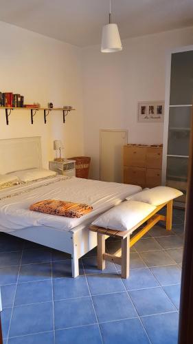 En eller flere senge i et værelse på Villino moderno con giardino a 90 metri dal mare