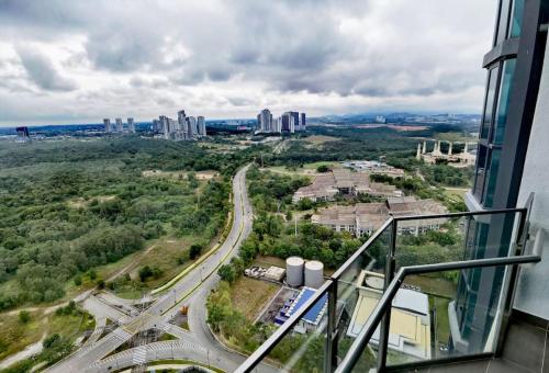 a view of a city from a building at Almas Muji Studio 100mbps Netflix STAY in Nusajaya