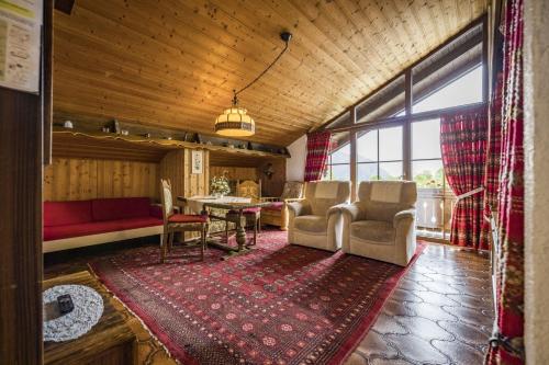 Ruang duduk di Gästehaus Färbinger