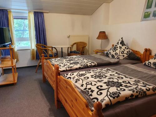 Ένα ή περισσότερα κρεβάτια σε δωμάτιο στο Hotel Jungmann