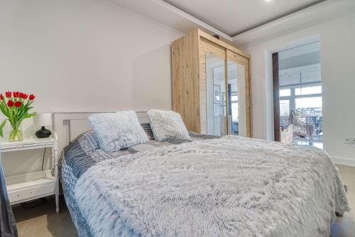 Postel nebo postele na pokoji v ubytování HAB Home Apartman