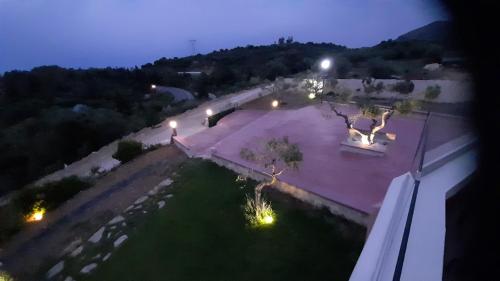 an overhead view of a backyard at night at Georgioupoli Studios in Georgioupolis
