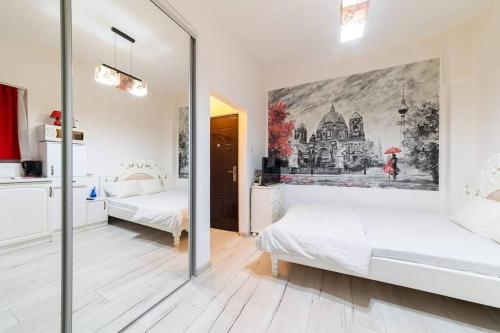 Postelja oz. postelje v sobi nastanitve CozyBucharest Studio