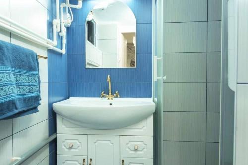 Kopalnica v nastanitvi CozyBucharest Studio