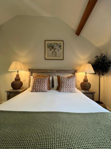 A bed or beds in a room at The Red Lion Inn Alnmouth