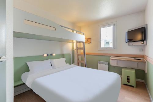 Кровать или кровати в номере B&B HOTEL Strasbourg Nord Schiltigheim