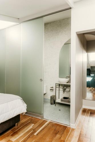Ein Bett oder Betten in einem Zimmer der Unterkunft Kokoa Hotel Cusco