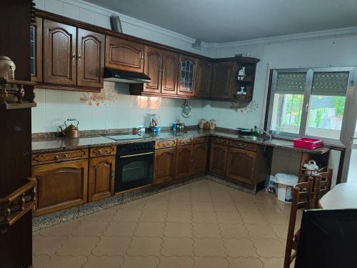 Kuchyň nebo kuchyňský kout v ubytování QUINTA ANDAINA