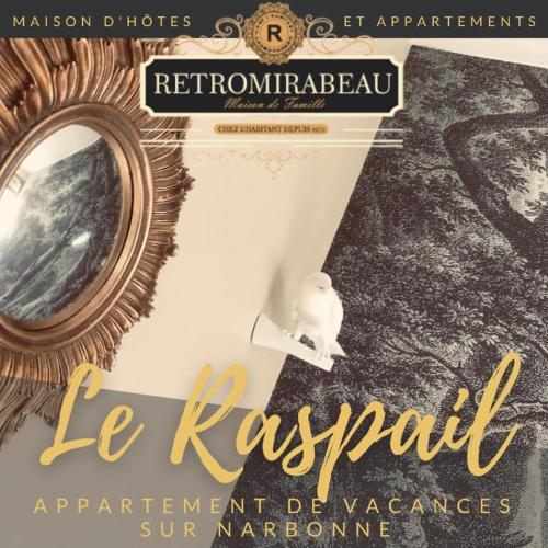 a book with a picture of a mirror on a wall at RétroMirabeau - CHAMBRE Suite & APPARTEMENTS de Charme - Localisation Prémium in Narbonne
