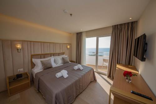 Postel nebo postele na pokoji v ubytování Merar Hotel
