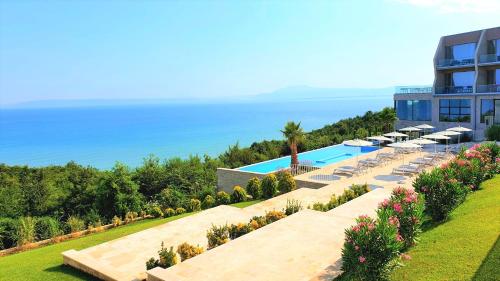 an image of a resort with a swimming pool at Duplex Seaview Condo in Durrës