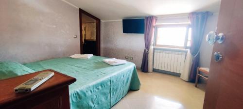 Postel nebo postele na pokoji v ubytování Affittacamere Stranamore