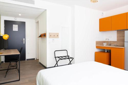 Ένα ή περισσότερα κρεβάτια σε δωμάτιο στο Kabane Montpellier