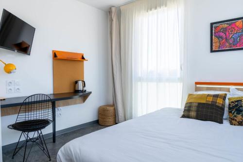 Ένα ή περισσότερα κρεβάτια σε δωμάτιο στο Kabane Montpellier