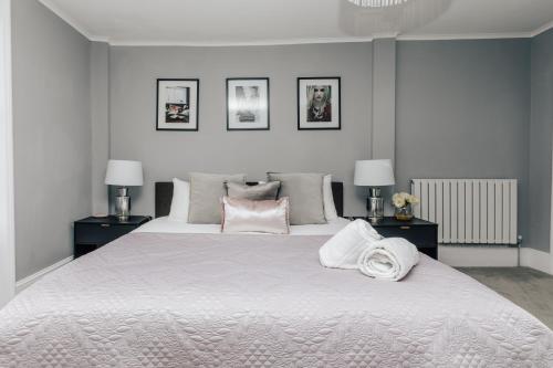 Voodi või voodid majutusasutuse The Mulberry toas