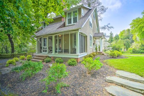 a house with a pathway leading to the front yard at Elegant Charles Town Home Grill, Walk Dtwn! in Charles Town