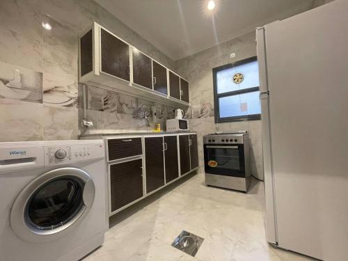 Kuchyň nebo kuchyňský kout v ubytování Golden Dahlia Fintas