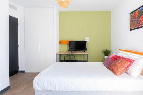 Postel nebo postele na pokoji v ubytování Kabane Montpellier