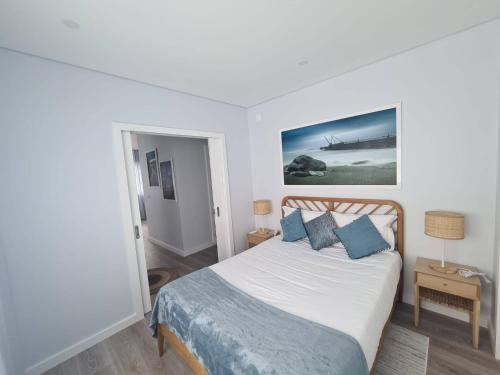 Ένα ή περισσότερα κρεβάτια σε δωμάτιο στο A Casa da Areia Larga