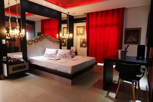 Llit o llits en una habitació de Motel Luxury