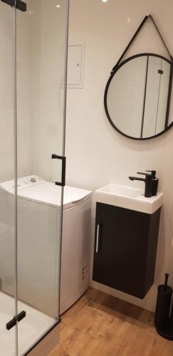 Kúpeľňa v ubytovaní Apartament u Kasi z widokiem na Zamek Malborski