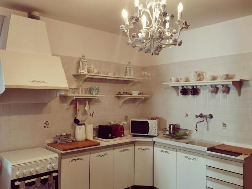 Η κουζίνα ή μικρή κουζίνα στο Appartamento Ca' Di Nive